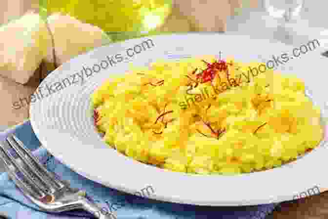 A Creamy And Vibrant Image Of Risotto Alla Milanese, Featuring Perfectly Cooked Arborio Rice Combined With Saffron, Parmesan Cheese, And White Wine. ITALIAN CUISINE: The Recipes Of Ten Most Famous Italian Dishes In The World To Be Easily Prepared At Home