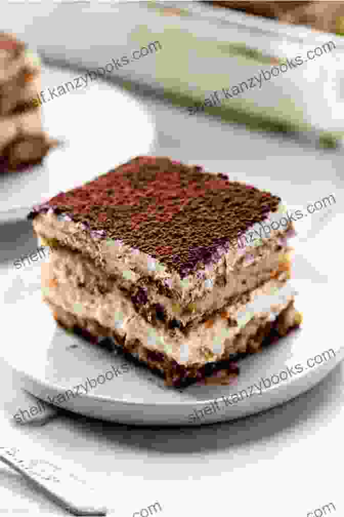 A Delectable Image Of A Creamy And Decadent Tiramisu Served In A Glass With Layers Of Espresso Soaked Ladyfingers And Mascarpone Cream. ITALIAN CUISINE: The Recipes Of Ten Most Famous Italian Dishes In The World To Be Easily Prepared At Home