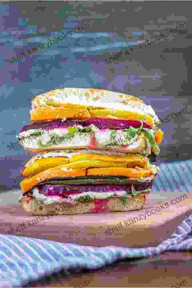 A Vibrant Vegetarian Sandwich, Showcasing A Colorful Array Of Roasted Vegetables, Hummus, And Fresh Herbs, Nestled Between Two Slices Of Whole Wheat Bread. Tasty Sandwiches: Delicious Sandwich Recipes For Beginners